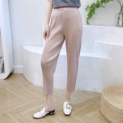 Summer pleated pants carrot ສໍາລັບແມ່ຍິງ 2024 ສະດວກສະບາຍແລະສະດວກສະບາຍ tapered pants ເກົ້າຈຸດ niche ການຄ້າຕ່າງປະເທດເຄື່ອງນຸ່ງຫົ່ມຂອງແມ່ຍິງ