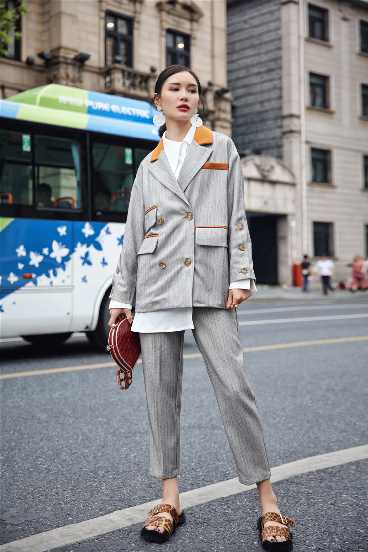 Original retro bất đối xứng pocket hit màu gió Anh phù hợp với áo khoác rộng quần chân yếm suit casual mùa thu mới quần áo đẹp nữ