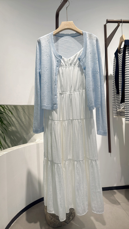 New Style Hollow-Out Cardigan and Fashionable Suspender Skirt Set