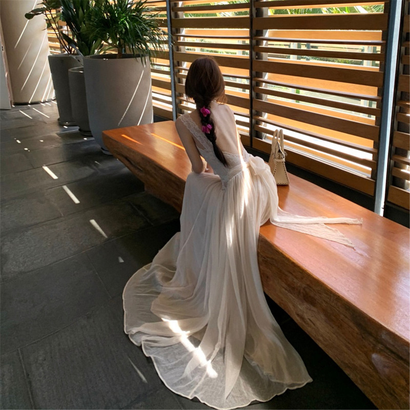 Beautiful and Ethereal Summer Slip Dress for Women, Featuring Lace Splicing, Backless Design, Flowing Tulle, and a Floor-Length Beach Dress