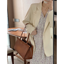 Suit coat women 2021 spring new Korean version of loose design feeling small casual rice white little coat