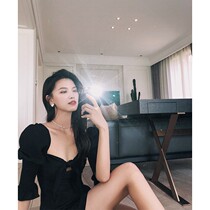 Ye Xiaoxian retro French Hepburn style small black dress spring and summer thin middle sleeve bow hollow dress short