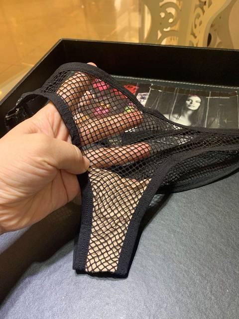 Sexy ຕາຫນ່າງສີດໍາຂອງແມ່ຍິງ panties lace panties ຕ່ໍາແອວ T-pants ບາງ thong ແບບເອີຣົບແລະອາເມລິກາ