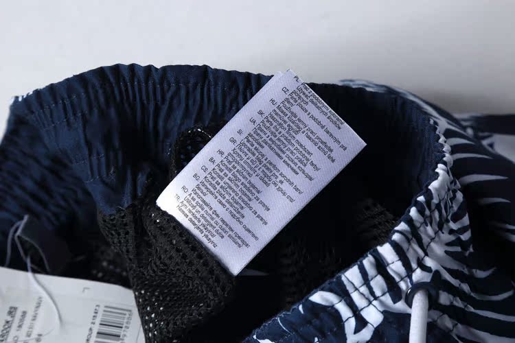 Cậu bé Đức chống nước văng mùa hè ETIRE bên bờ biển chơi nước bơi kỳ nghỉ in quần đi biển 	quần 7 màu đi biển