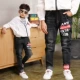 Quần jean bé trai mùa xuân phiên bản Hàn Quốc của quần áo trẻ em lớn quần trẻ em quần trẻ em quần đơn bé trai quần chân mùa xuân và mùa thu - Quần