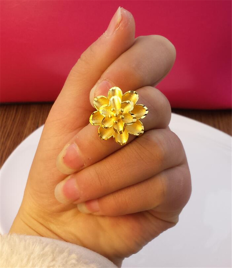 Vietnam Sha Jin Glossy Flower Nữ Mô phỏng Cặp đôi mạ vàng Nhẫn vàng khai trương Quà tặng cô dâu không màu lâu dài nhẫn titan