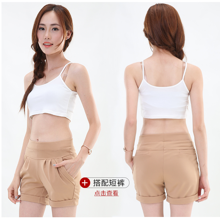 Mặc một chiếc áo len ngắn vào mùa hè, mặc một chiếc áo sơ mi chạm đáy được quấn trong một chiếc áo vest trên ngực áo kiểu nữ đẹp tuổi 40