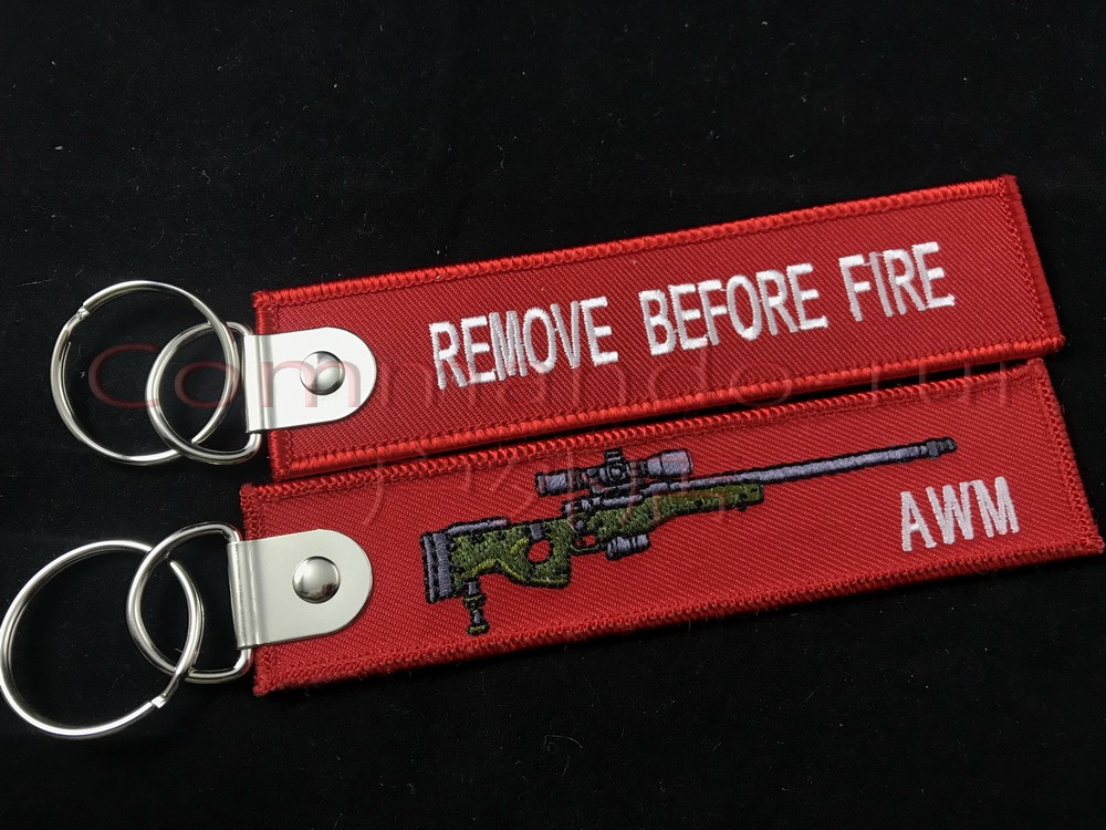AWM Sniper Rifle REMOVE BEFORE FIRE removes the keybutton zipper before firing