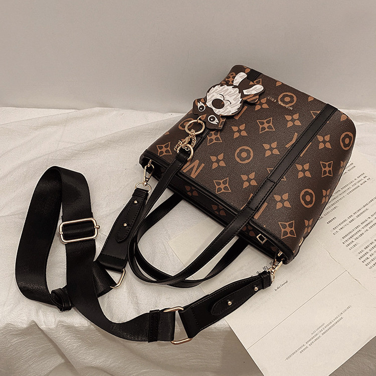 Hong Kong Pet Backpack Bucket Bag Cartoon Handheld Messenger Bag Classic Retro Leisure Student Bag Net Red Recommendation