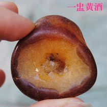 A cup of yellow wine red agate seeds hand-played pieces of Madagascar rough ornamental stones collection of treasures