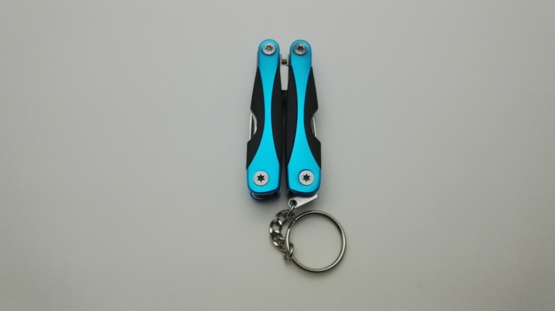 Mini đa chức năng kết hợp quà tặng ngoài trời di động đa mục đích kìm công cụ phổ key ring pocket công cụ kìm