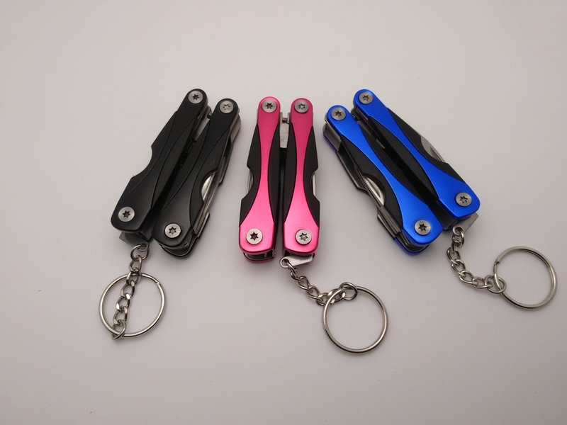 Mini đa chức năng kết hợp quà tặng ngoài trời di động đa mục đích kìm công cụ phổ key ring pocket công cụ kìm