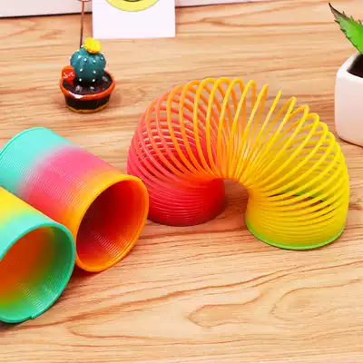 Boxed rainbow circle toy rainbow stacked music children's spring ring Magic pull ring elastic ring plastic cartoon