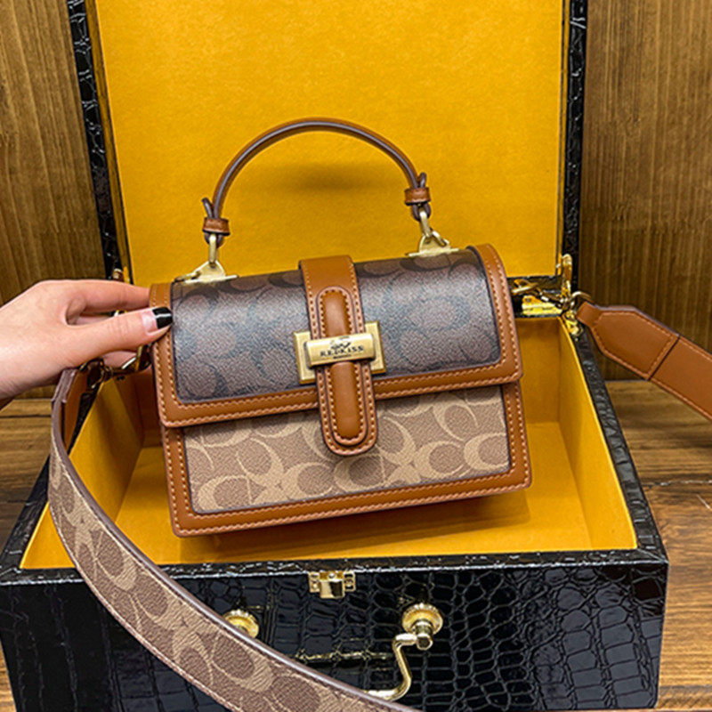 Hong Kong light luxury horse-drawn carriage leather hand-held ladies bag 2022 new one-shoulder messenger small square bag tide chest bag