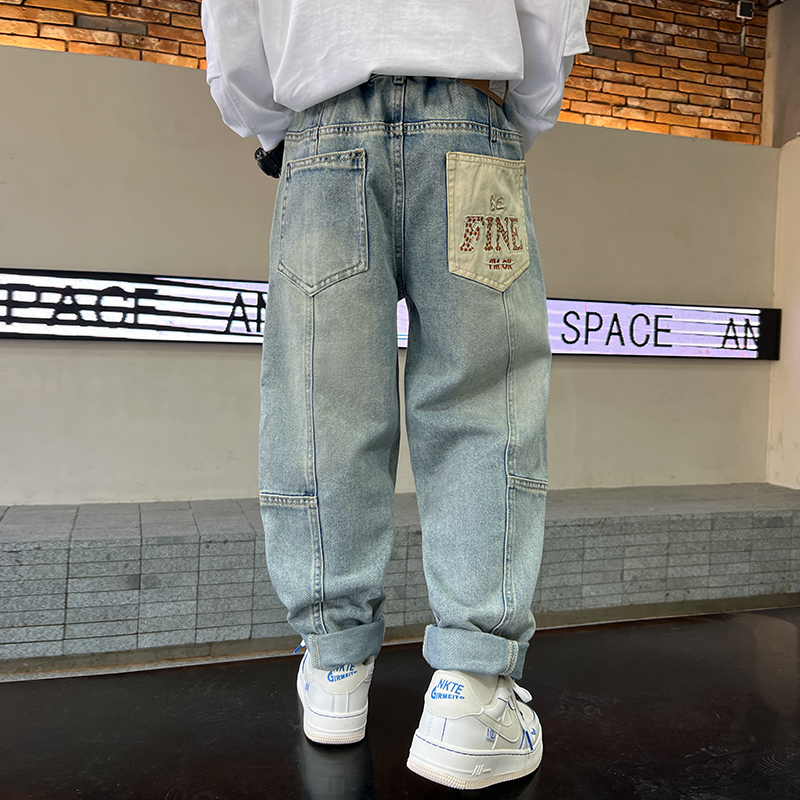 子供服男の子春服ハンサムジーンズ2025新しいパンツ春と秋スタイルビッグボーイ春ズボントレンド