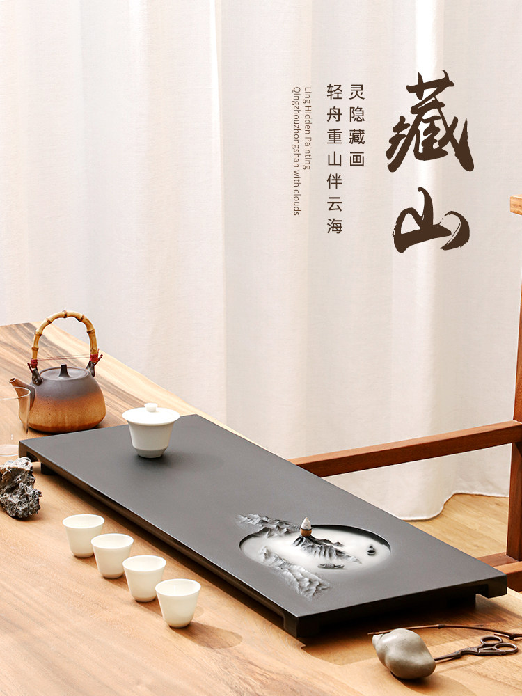 Natural whole piece of black gold stone tea tray large relief carving tea tray modern tea sea trumpet home simple drainage tea table