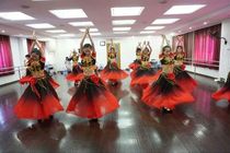 Xinjiang dance suit Why is the flower so red stage performance suit Uighur minority clothing adult female skirt