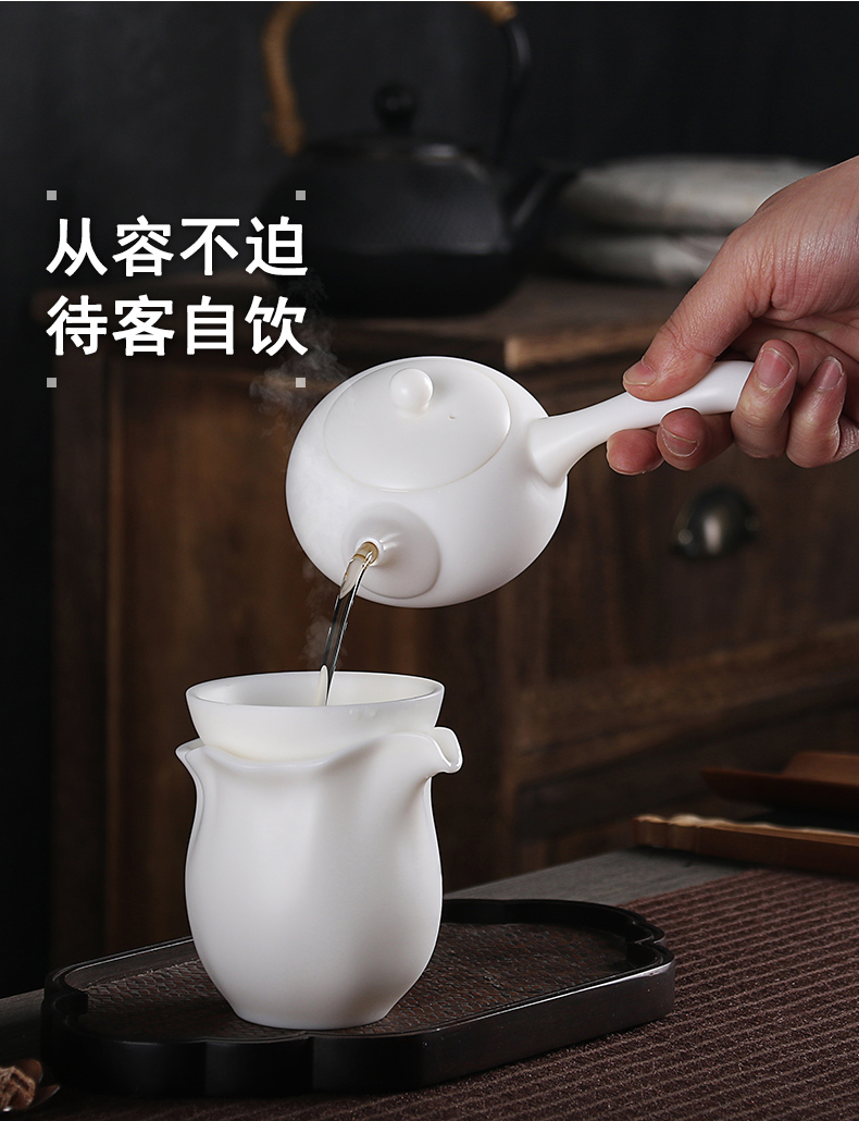 True sheng Chinese white dehua white porcelain kung fu tea set sealed ball hole side put the pot of tea of a complete set of gift set