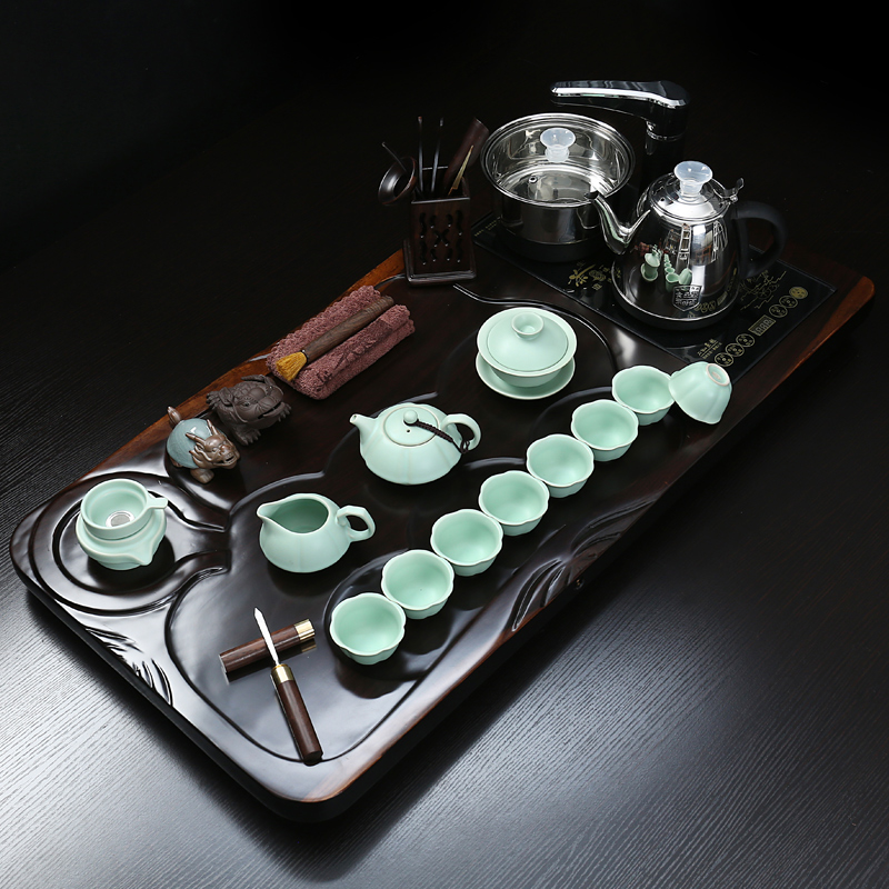 Really hold a complete set of ebony suit household kung fu tea tray tea sets tea cup tea tea kettle automatically