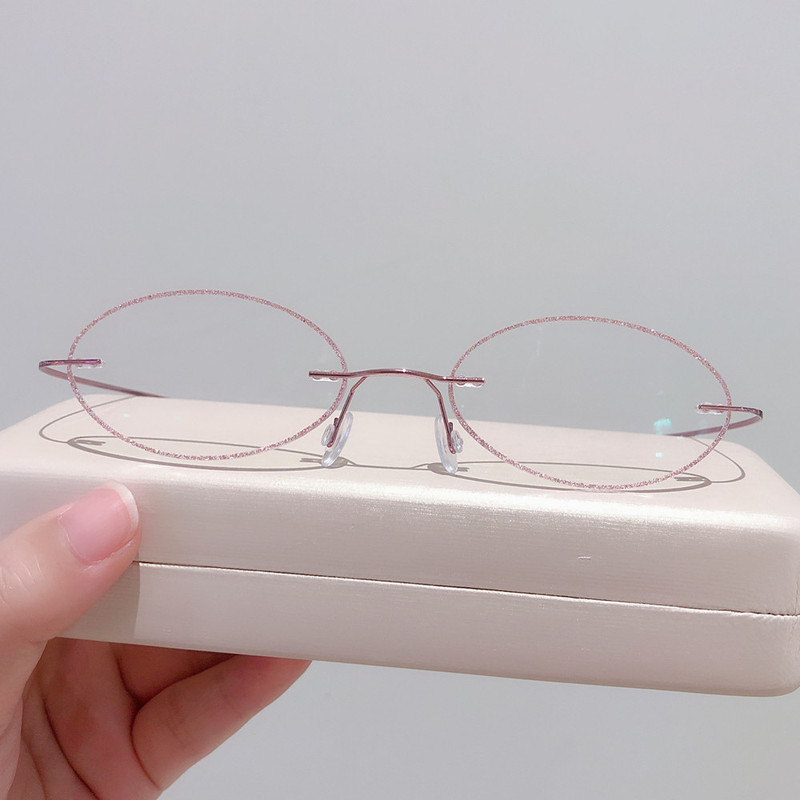 Frameless Pink Glitter-Edged Oval Glasses Frame for Women with Small Faces, Ultra-Light Memory Temple Arms, Suitable for High Prescription Lenses