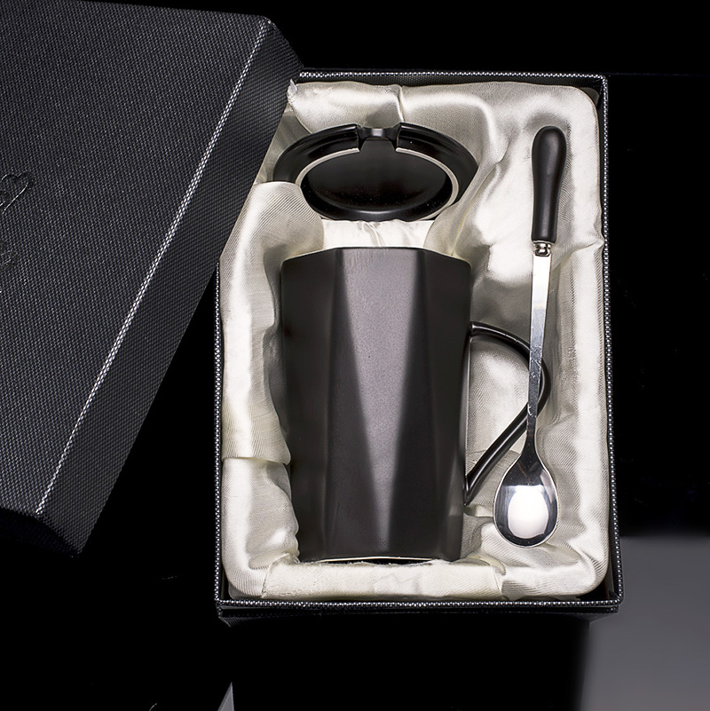 Office ceramic cups individuality creative trend mark cup with cover teaspoons of men 's and women' s household milk ultimately responds. A cup of coffee