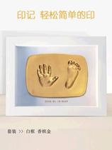 Children's full moon feet Indonesian babies hang pictures on their footprints to commemorate their first year of life.