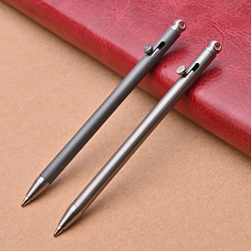 Titanium alloy mini gun bolt with portable key buckle tool pen ballpoint pen to sign for a rainy day