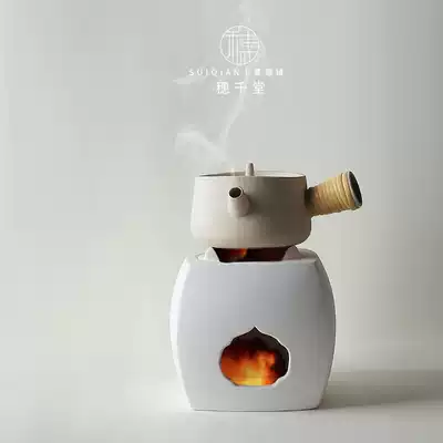 Sui Qantang handmade Japanese white mud carbon oven white pottery cooking teapot black crystal stove heating tea stove open fire Tea Ware