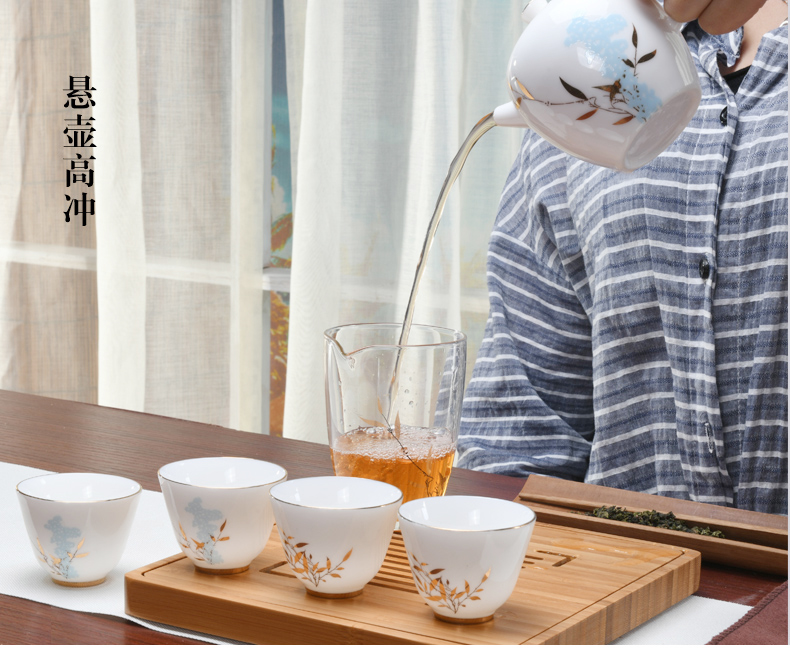 Xu ink customization jade porcelain cup to crack a pot of four cups of tea tureen contracted on - board, portable is suing travel tea set