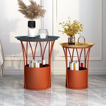 A few light luxury and a few iron disc tea table in the small round table living room of Nordic bedside