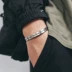 Thương hiệu thời trang Âu Mỹ vòng tay nam cá tính vòng tay titan chữ hàn hàn quốc đen mở không phai trang sức tay chữ - Vòng đeo tay Cuff