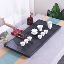 Natural black gold stone tea tray Household simple tea table large and small whole stone tea sea Kung Fu tea set tray