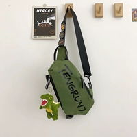 Зеленый (с большими подвесками и значками тиранозавра)