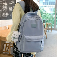 Синий значок, зеленый шейный платок