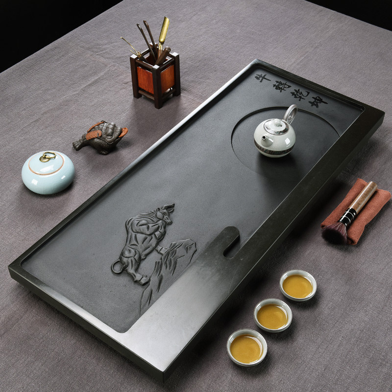 The whole piece of natural Ujiuji tea plate household with modern minimal cow to dry kun tea sea stone size stone tea table