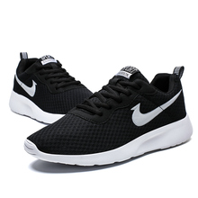 大码男鞋新款情侣运动鞋跑步气垫网面潮鞋