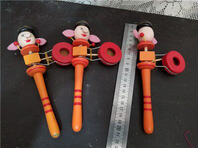 Old toy solid wood rings to shake hands and turn 3 models