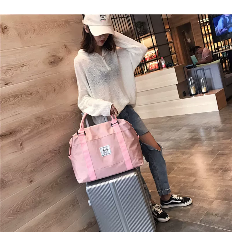 Túi du lịch nữ xách tay thể thao nhẹ lưu trữ túi thể dục Phiên bản Hàn Quốc của mạng khoảng cách ngắn dung lượng lớn du lịch màu đỏ túi duffel nghèo - Túi du lịch