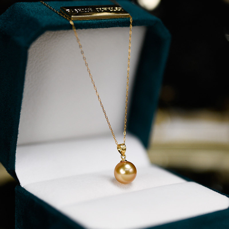Nanyang gold pearl pendant 18K gold melon seed buckle pearl sea water Y word chain necklace near positive round 10-11mm Tahiti
