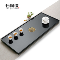 Natural black gold stone tea tray household living room tea table simple size stone tea sea Kung Fu tea tray creativity