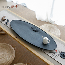 View the whole piece of natural Wujin Stone tea tray Stone tea table black gold stone stone Tea home simple kung fu tea set