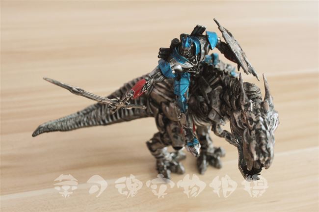 Transformers Movie 4 Hornet trôi Optimus Prime Cáp thép Tyrannosaurus Tượng khủng long tay Mô hình đồ chơi - Gundam / Mech Model / Robot / Transformers