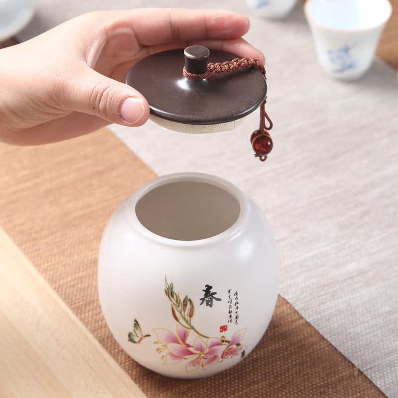 Spring, summer, autumn and winter ceramic tea tins gift boxes aneroid general pu 'er tea, green tea sealed tank half jins installed