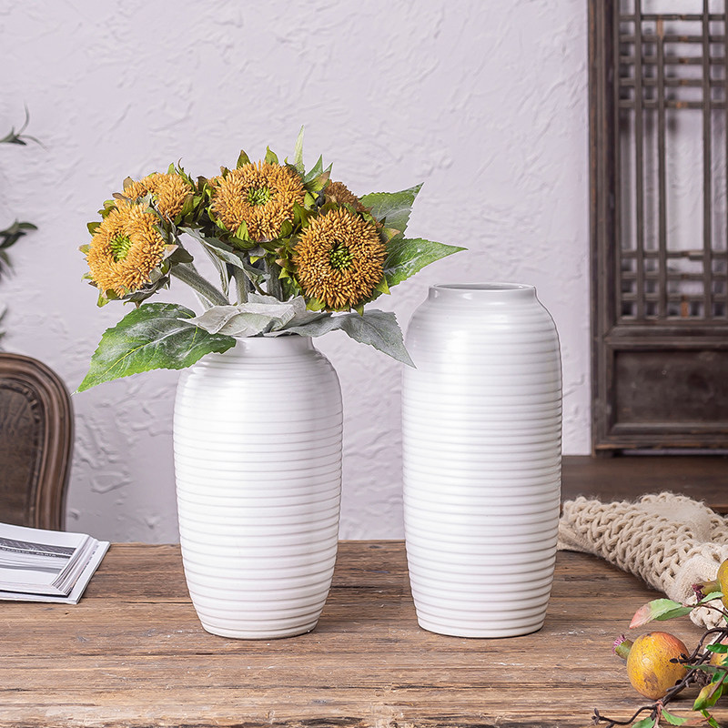 The white ceramic hydroponic bottle Jane modern Nordic furnishing articles living room flower arrangement table dry flower vase suits for