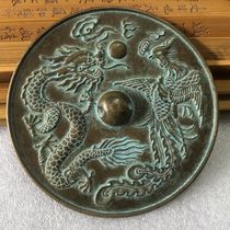 Collection of antiques and miscellaneous bronzes antique bronze mirrors dragon and phoenix auspicious bronze mirror ornaments old Taoist dragon and phoenix bronze mirrors