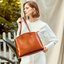  Ji Shizhe leather womens bag 2021 new European and American style shoulder bag atmospheric womens portable fashion tote womens bag