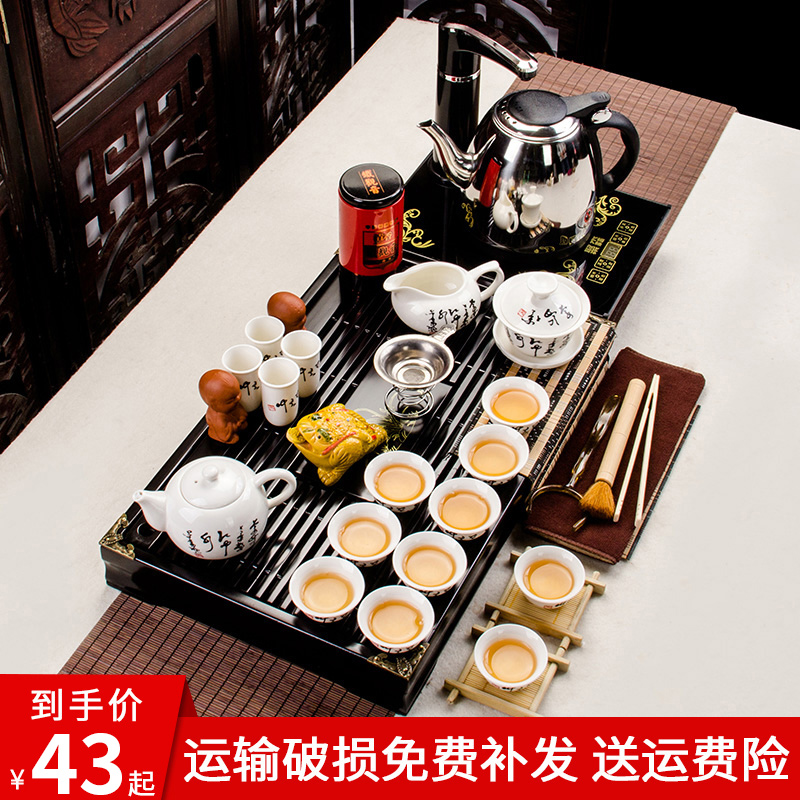 Kongfu tea furniture group home whole set of solid wood tea tray special price purple sand tea tea pot cup ceramic glass accessories complete set