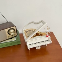 Фортепианная туба (с кружащейся танцующей девушкой)