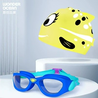 Синяя желтая плавательная шапочка, объектив