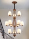 Large Chandelier in the Living Room of a Duplex House, American-Style Rotating Vintage Loft Apartment, Open-Air Three-Story Stairwell Large Chandelier